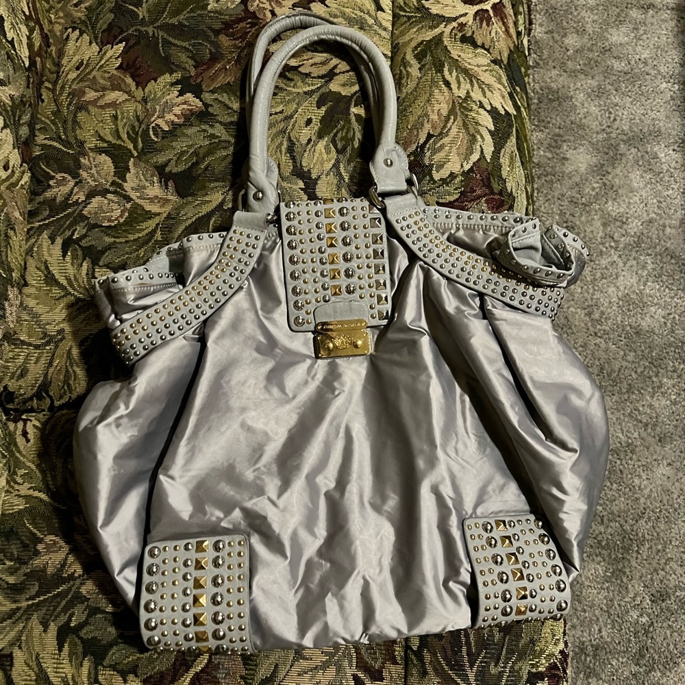 Excellent condition Large Purse in silver with studs.